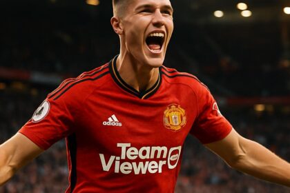 Benjamin Sesko merayakan gol dengan jersey Manchester United.
