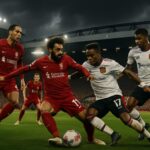 Pemain Liverpool dan Manchester United berebut bola di Anfield