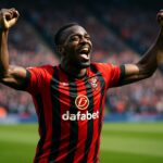 Pemain sepak bola Bournemouth, Antoine Semenyo, merayakan golnya di lapangan hijau.