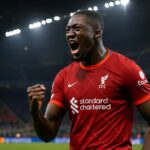 Ibrahima Konaté merayakan gol sundulan ke gawang Inter Milan di San Siro.